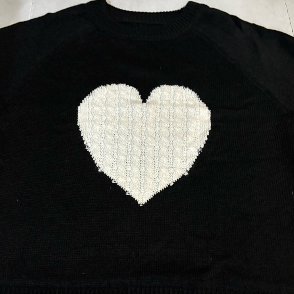 Ladies Black sweater with cream/off-white heart.No labels. Large or XLarge